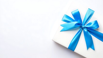 Beautifully wrapped gift box with blue ribbon