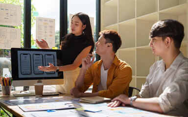 Health consultant conducting a virtual session, holding an apple as she discusses food choices. Concept of telehealth, and remote wellness.