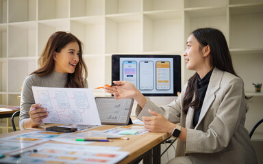 Health consultant conducting a virtual session, holding an apple as she discusses food choices. Concept of telehealth, and remote wellness.