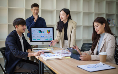 Health consultant conducting a virtual session, holding an apple as she discusses food choices. Concept of telehealth, and remote wellness.