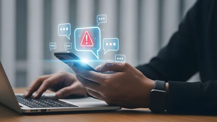 Person using smartphone and laptop with digital interface