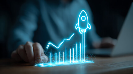 Neon rocket graph ascending with person typing on laptop growth