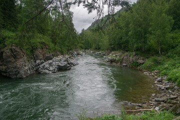 A river runs through a canyon in the mountains	
