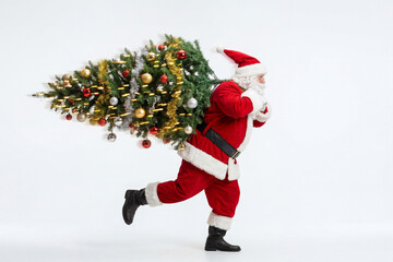 Santa Claus running with a decorated Christmas tree on his shoulder on white background. Banner template for Holiday delivery and festive rush concept winter celebration with copy space.