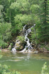 Waterfall in the mountain in summer