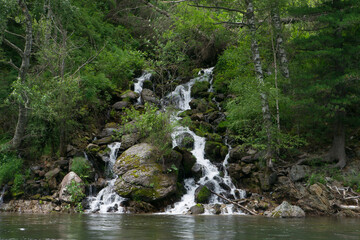 Waterfall in the mountain in summer
