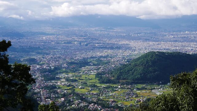 Wide angle view of ecofriendly city Kathmandu Valley with buildings and greenery or infrastructure and nature.