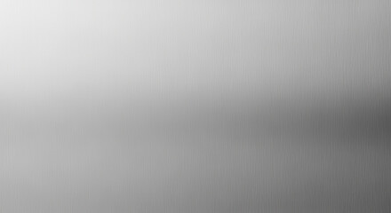 Fototapeta premium Minimalist brushed metal background with smooth silver gradient and subtle vertical line texture for modern design concepts