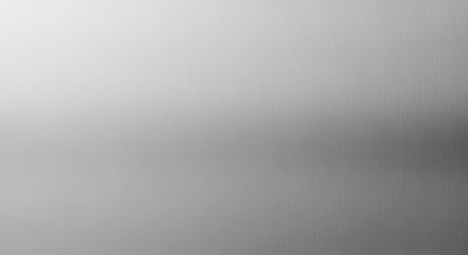 Minimalist brushed metal background with smooth silver gradient and subtle vertical line texture for modern design concepts