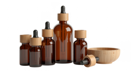 Various amber glass dropper bottles with wooden caps and mortar isolated on a transparent background