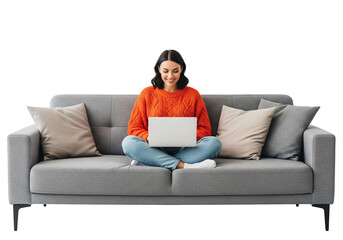 Smiling Woman in Orange Sweater Using Laptop While Sitting on Grey Sofa