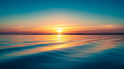 Fototapeta premium Beautiful sunset over the calm ocean water