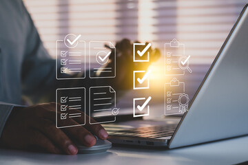 Businessman mark off items on digital checklist, Quality assurance technology, representing...