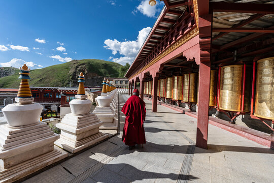 Prayer wheel around the large Mani stone pile on Gerima village, Tagong (Lhagang), Garz&ecirc; Tibetan Autonomous Prefecture, Sichuan,  China