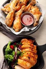 Family dinner. Roasted chicken with vegetables. Healthy eating.