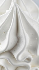 Closeup of creamy vanilla ice cream texture. Dessert surface, cloud dancer color of the year concept. Sweet soft treat for food advertising. Cloud Dancer Color of the Year 2026. Vertical