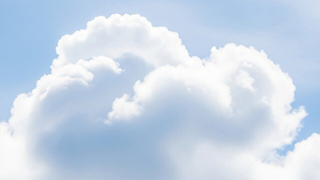 Close up of a large cloud in the sky. Natural cloudscape background in cloud dancer color. Weather concept. Cloud Dancer Color of the Year 2026