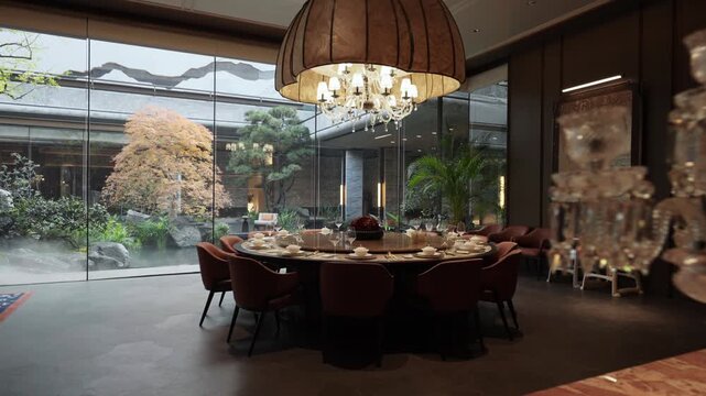 Elegant dining setup by garden view