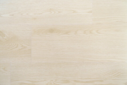 Seamless light-colored wood grain flooring