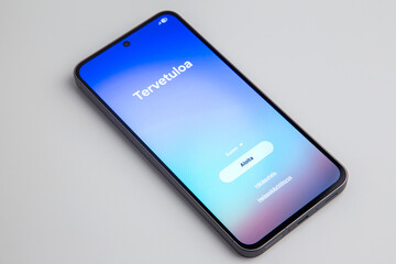 welcome screen on smartphone in Finnish