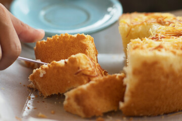 Freshly Sliced Cheese Cake with Golden Crust