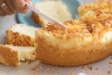Freshly Baked Savory Cake Cut by Hand