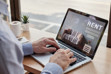 rent website on laptop screen, rent online concept, man using internet to search rental apartments, houses and flats