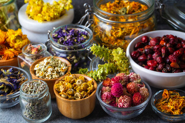 Assortment of dry herbal tea concept. Medicinal herbs healing herbs and alternative medicine.
