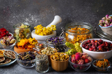 Assortment of dry herbal tea concept. Medicinal herbs healing herbs and alternative medicine.