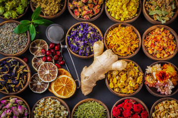 Assortment of dry herbal tea concept. Medicinal herbs healing herbs and alternative medicine.