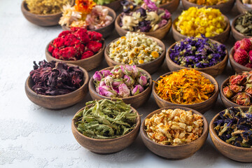 Assortment of dry herbal tea concept. Medicinal herbs healing herbs and alternative medicine.