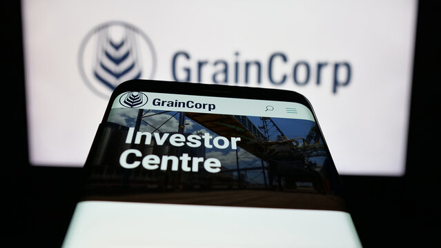 Stuttgart, Germany - 12-05-2025: Mobile phone with website of Australian commodity company GrainCorp Ltd. on screen in front of logo. Focus on top-left of phone display.