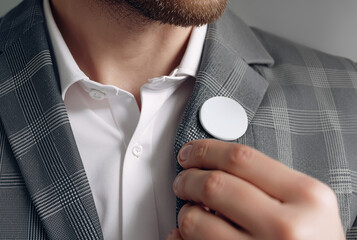 Blank white round button badge on classic blazer mockup, ai generated