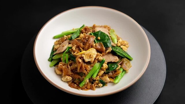 Stir fried Rice Noodles(flat noodle) with Soy Sauce egg and Pork,Pad See Ew