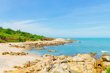 Beautiful Tropical beach and ocean landscape of Dajiao Park in Qizi Bay (Qiziwan), Changjiang, Hainan, China