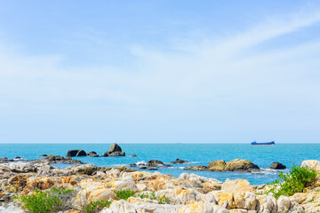 Beautiful Tropical beach and ocean landscape of Dajiao Park in Qizi Bay (Qiziwan), Changjiang, Hainan, China