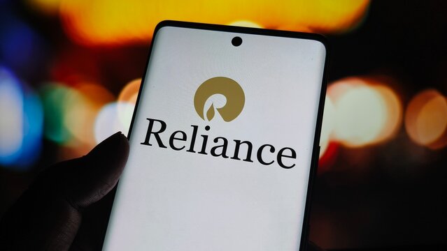 Closeup of reliance industries logo and name displayed on a modern smartphone screen with a blurred colorful background  , New York City, 15 December 2025