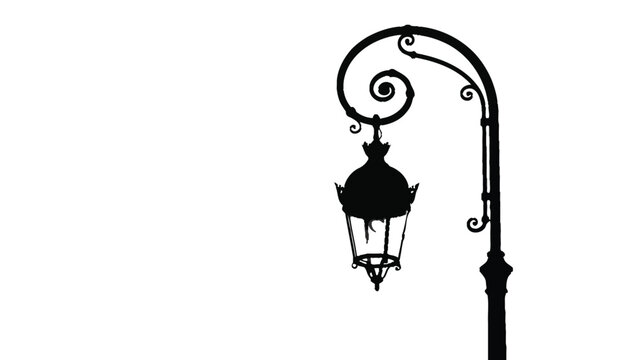 Silhouette of an ornate vintage street lamp 