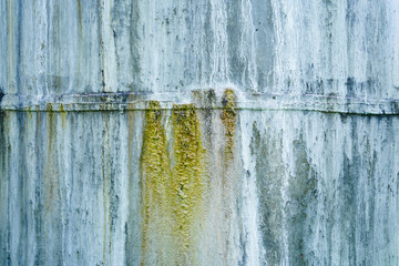 Old and grunge cement tank, concrete or plaster tank with with horror nuances with brown drips,  texture and background for your projects and creative work.