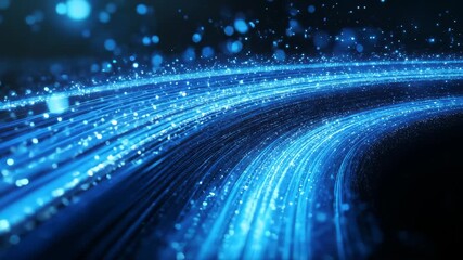 Glowing blue light trails curve through a dark space with bokeh effect creating a futuristic abstract background with streaks of light and particles 4k video - Powered by Adobe
