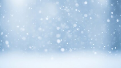 Fototapeta premium Gentle Snowfall Over a Winter Landscape with Soft Blue Hues and Blurred Snowflakes, Perfect for Holiday, Seasonal, or Cold Weather Themes