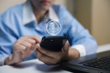 A person interacts with a smartphone, surrounded by digital icons representing SEO and technology, highlighting the fusion of communication and digital marketing.
