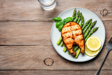 Grilled salmon fish steak and asparagus
