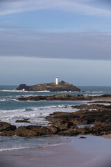 Godrevy Lighthouse at Godrevy Beach in Cornwall, UK.