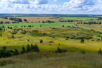 Hills with meadows and forests.