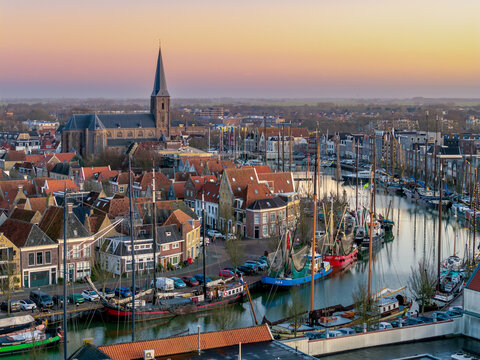 Aerial drone view of Harlingen harbour and historic canal district
