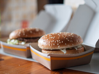 Delicious Fast Food Burgers in Takeout Boxes