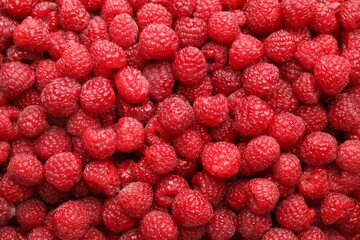Fresh ripe raspberries as background, top view