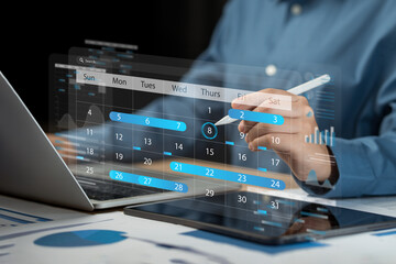 Time management and scheduling concept, business planning calendar, task schedule, work plan, goals, calendar, appointment reminder highlight, Businessman manages his time, plans and analyzes © Benjamas