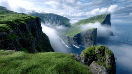 Green Coastal Cliffs with Mist Rolling Over Ocean